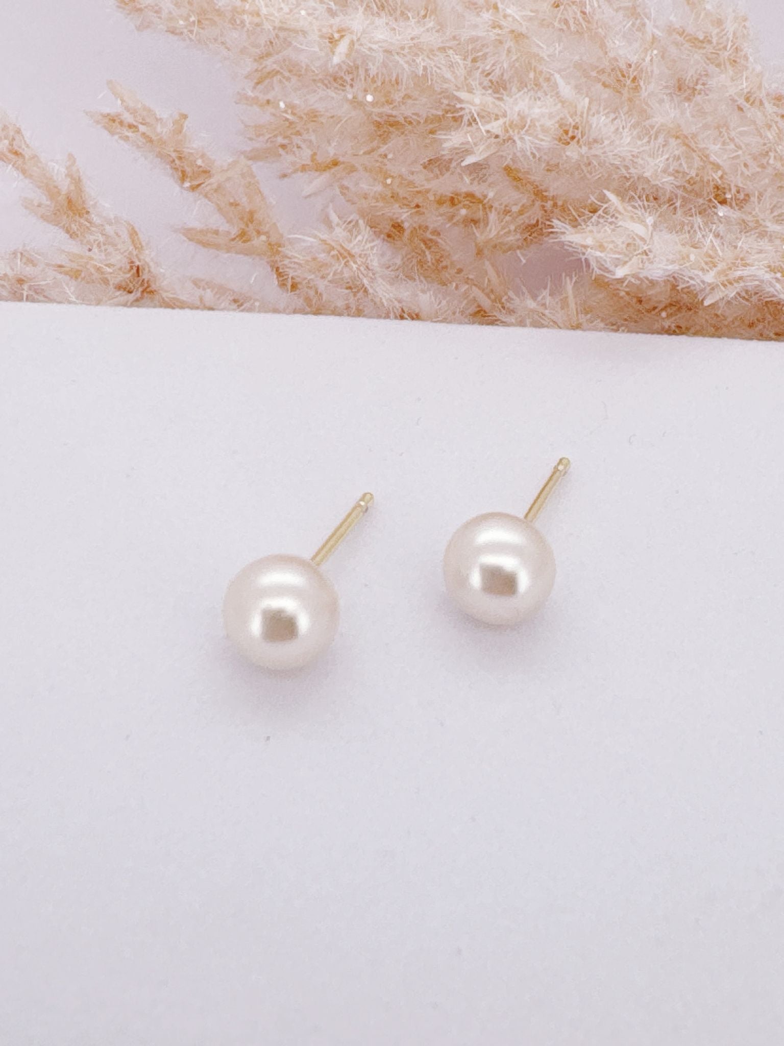 0069- PEARL EARRING 6mm