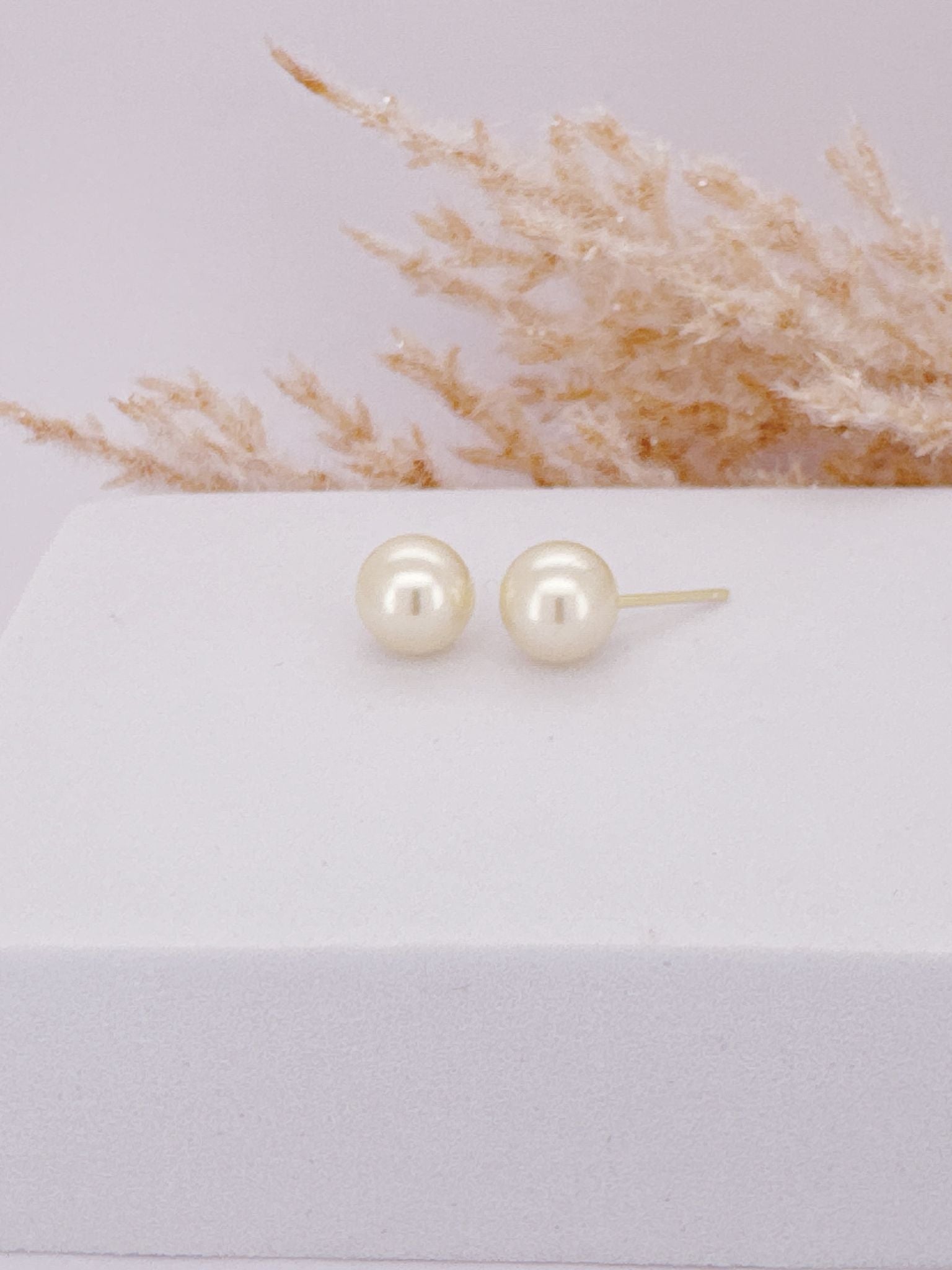 0069- PEARL EARRING 6mm